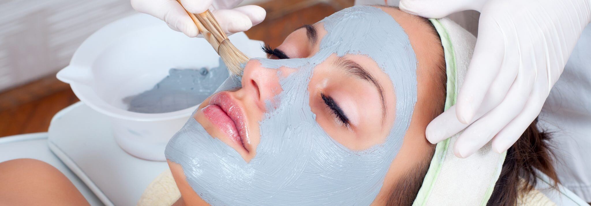 Blue Facial Mask Being Applied